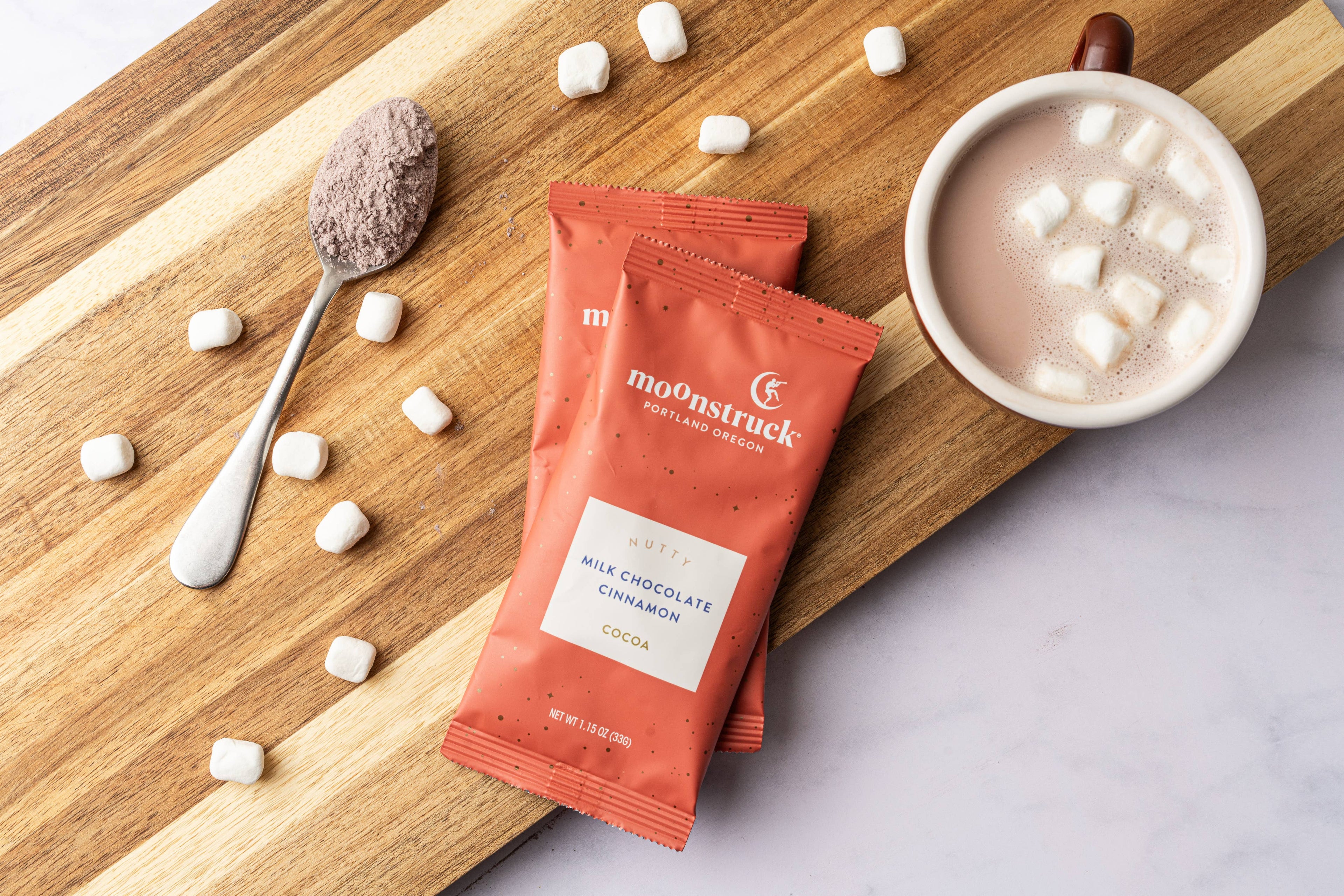 Moonstruck Chocolate Co - Nutty:Cinnamon Milk Chocolate Hot Cocoa Single Serving Pouch